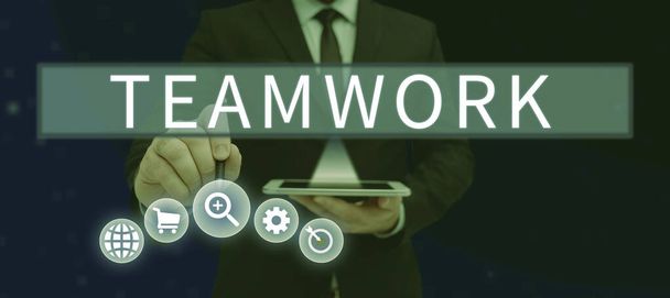 Bildunterschrift: Teamwork, Business Overview Gruppe, die zeigt, wer als Einheit und mit dem gleichen Ziel zusammenarbeitet - Foto, Bild
