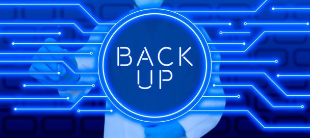 Konceptuální titulek Back Up, Business koncept ukládání důležitých dat do cloudu a jejich pozdější obnovení - Fotografie, Obrázek