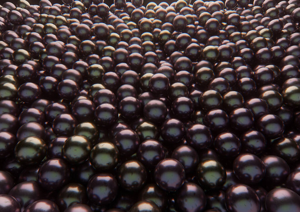 固体の背景を形成するために広がる黒い光沢のある真珠の配列- 3Dレンダリング - 写真・画像