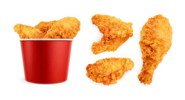 Kip fast food realistische set van geïsoleerde beelden met gebakken kippenvleugels verpakt in papier emmer vector illustratie - Vector, afbeelding