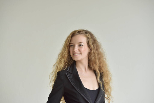 beautiful blonde businesswoman posing in studio  - Fotoğraf, Görsel