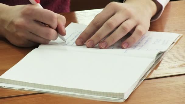 Pen writes in a notebook - Footage, Video