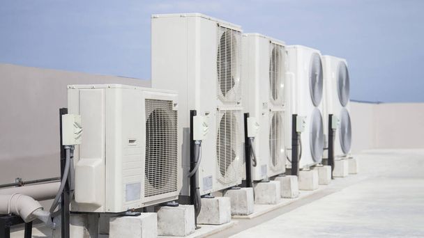 Air conditioning (HVAC) on the roof of an industrial building. - Foto, immagini