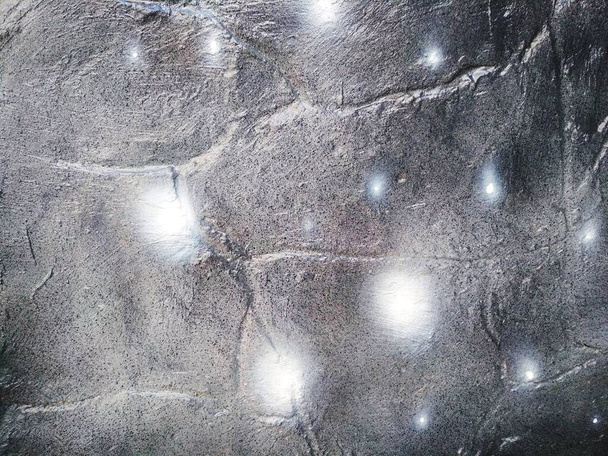Сяючі зірки на фоні пофарбованого каменю
 - Фото, зображення