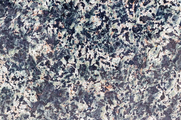 Textura de uma parede de pedra com fendas e arranhões que podem usar-se como um backgr. A textura da pedra. - Foto, Imagem