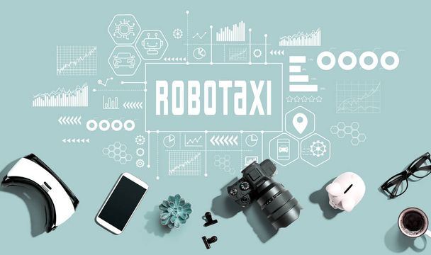 Robotaxi theme with electronic gadgets and office supplies - flat lay - Foto, immagini