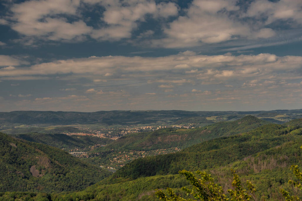 View from Varhost hill and lookout tower there for Ceske Stredohori mountains in summer - Фото, зображення