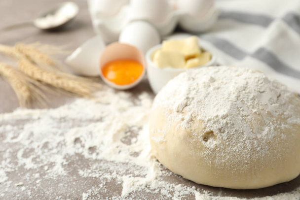 Wheat dough and products on table, closeup view with space for text. Cooking pastries - Foto, Bild