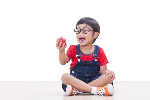 Little boy holding red apple - Photo, image