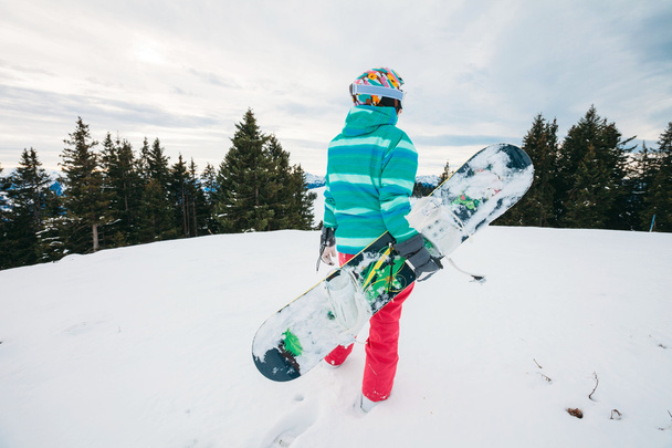 Snowboarder standing on top - Valokuva, kuva