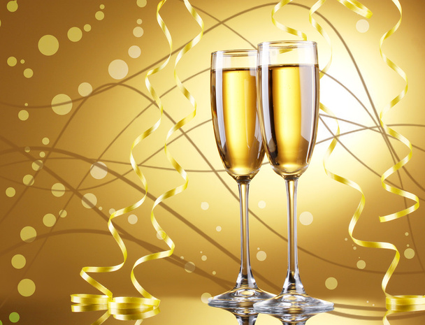 Glasses of champagne on bright background - Foto, immagini
