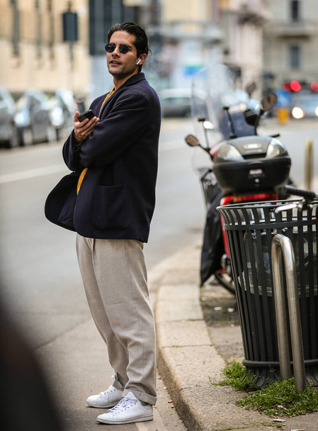 MILAN, Italy- February 27 2022: Men on the street in Milan. - Photo, Image