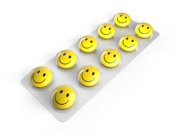 Comprimido do sorriso na bolha isolada no backgroung branco
 - Foto, Imagem