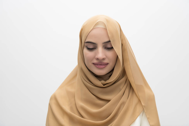 Portrait of young Muslim woman wearing hijab on isolated white background. High quality photo - Φωτογραφία, εικόνα