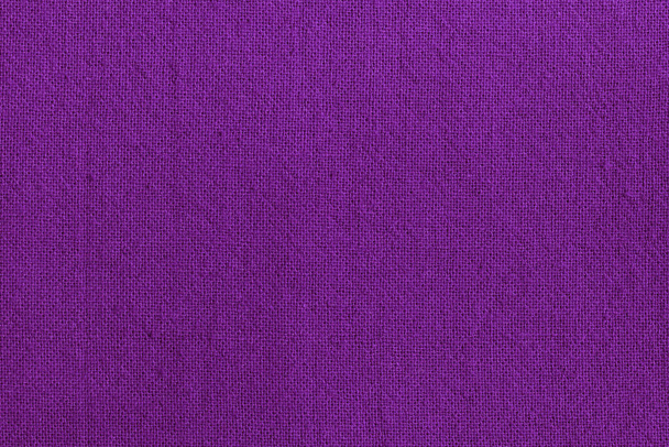 Фіолетовий тканинний фон текстури тканини, безшовний візерунок з натурального текстилю
. - Фото, зображення