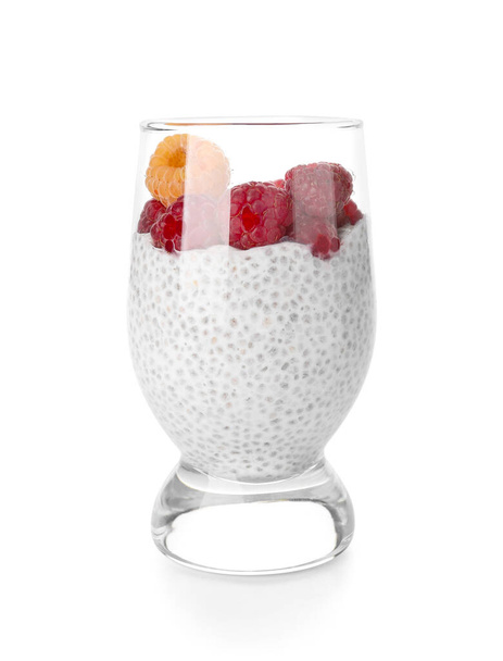 Glass with delicious chia seed pudding and raspberry on white background - Foto, imagen
