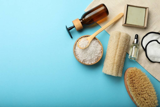 Flat lay composition with eco friendly products on light blue background, space for text - Fotografie, Obrázek