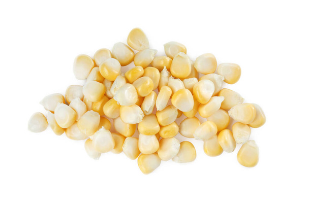 Pile of tasty fresh corn kernels on white background - Фото, изображение