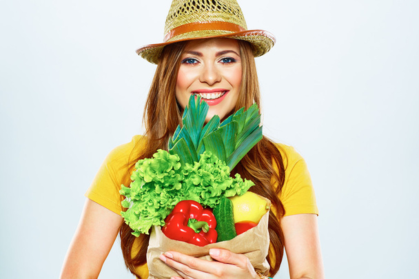 Woman holding vegan food - Photo, image