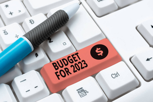 Концептуальный дисплей Бюджет на 2023 год Письменные оценки доходов и расходов на 2023 год, деловой подход Письменные оценки доходов и расходов на 2023 год - Фото, изображение
