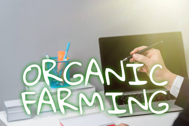 Handwriting text Organic Farmingan integrated farming system that strives for sustainability, Business overview an integrated farming system that strives for sustainability - Photo, Image