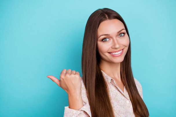 Photo of pretty positive lady bright shiny grin arm direct empty space offer proposition beauty procedure isolated on cyan color background. - Foto, immagini