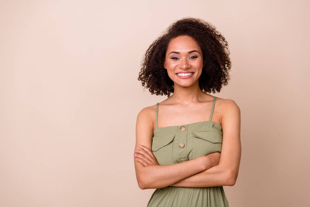 Photo of lovely sweet cheery lady toothy smile dressed trendy khaki clothes outfit stand empty space isolated on beige color background. - Φωτογραφία, εικόνα