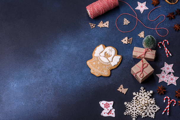 Christmas composition with gingerbread cookies, Christmas toys, pine cones and spices. Winter holidays background - Φωτογραφία, εικόνα