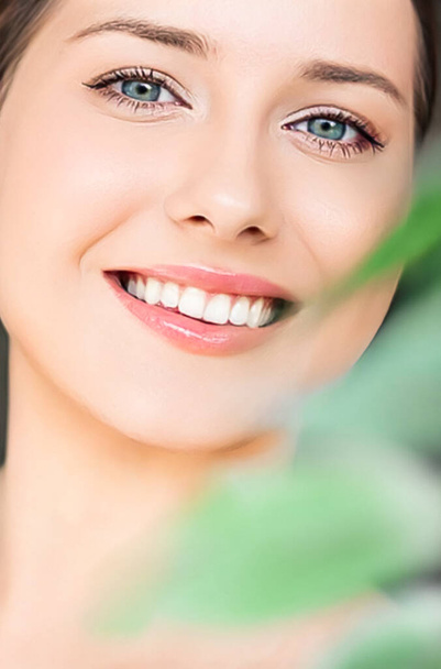 Natural beauty, perfect white teeth and healthy smile, beautiful woman in nature for skincare cosmetics and dental care, close-up portrait - Zdjęcie, obraz