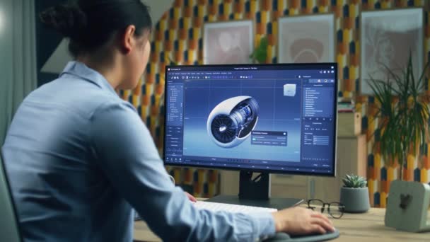 Nainen 3D-suunnittelija käyttää pc ammatillinen ohjelma ja luoda 3D prototyyppi lentokoneen turbiini työskennellessään etänä kotona toimistossa - Materiaali, video