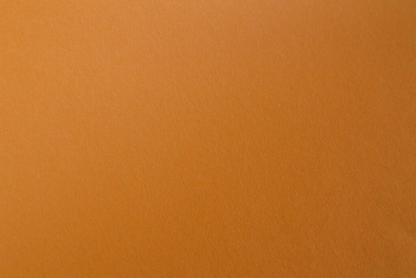 Textura de papel laranja vibrante para fundo. Textura de papelão laranja para fundos e papéis de parede - Foto, Imagem