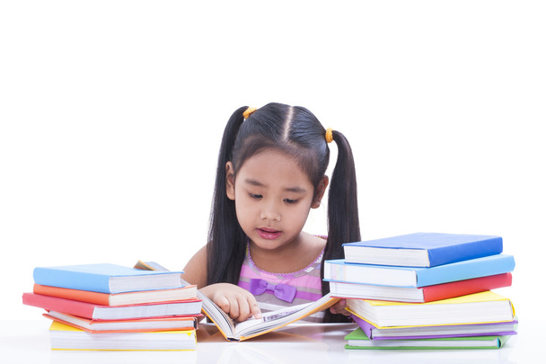 Little girl reading a book. - Fotografie, Obrázek