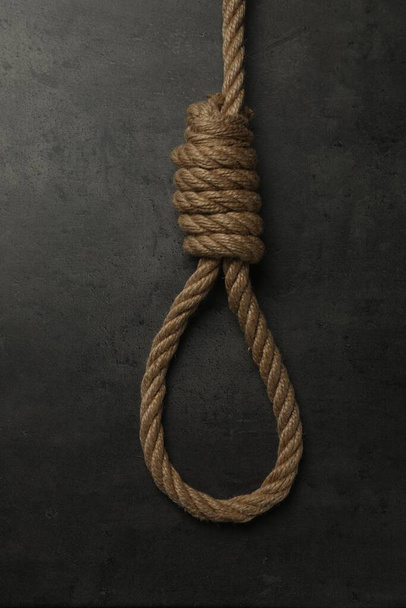 Rope noose with knot on grey table, top view - Photo, Image