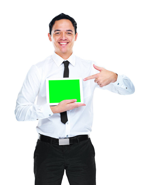 Helyezze ide az üzenetét. Egy fiatal üzletember egy tabletet tart zöld vászonnal. - Fotó, kép