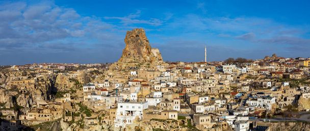 Fortress in the city of Ortahisar surrounded by houses. Turkey. - Photo, Image