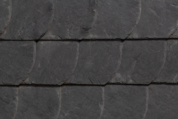 close up of black clay roof tiles on roof of house in Germany - Photo, Image