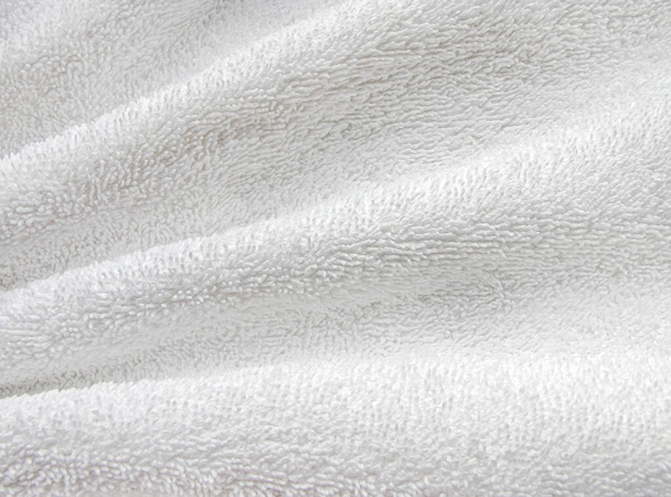 Белый мягкая морщинка махровые ткани одеяло текстура фона, обои, фон с пространством для текста. - Фото, изображение