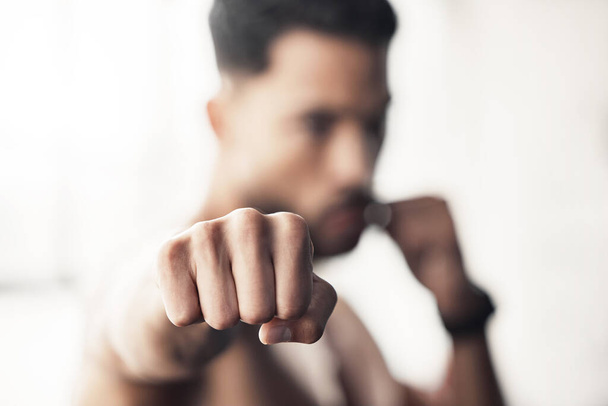 Boxer fist, fitness training and gym exercise for wellness, exercise for sports health and motivation for fight competition with power. Athlete boxing for cardio with background bokeh at club. - Foto, Imagem