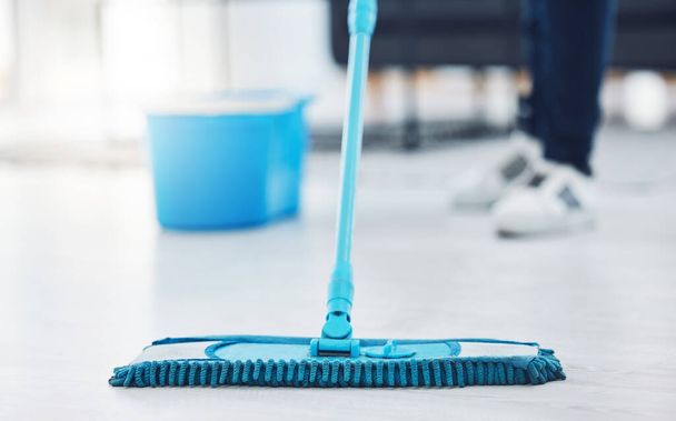 Woman, floor mop and cleaning housekeeping product for home cleaner in hygiene bacteria maintenance. Employee service zoom, maid and worker in healthcare spring clean of office building interior room. - Foto, Imagem