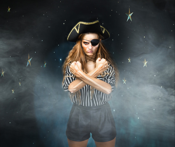 Woman pirate  on grey background - Foto, afbeelding