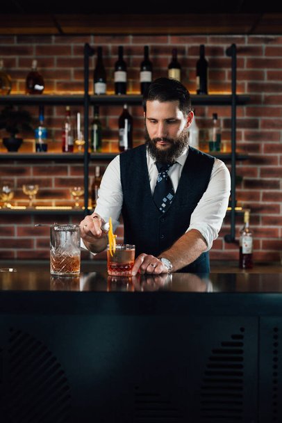 barman decorate negro martini cocktail - Photo, Image