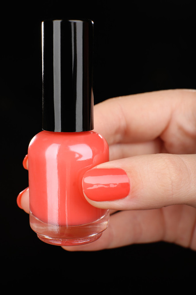 Nail polish in hand - Fotó, kép