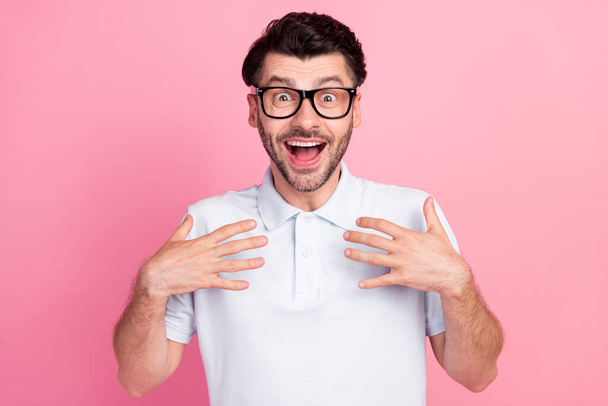 Closeup photo of young handsome positive bearded guy excited unexpected surprised reaction palms himself isolated on pink color background. - Photo, Image
