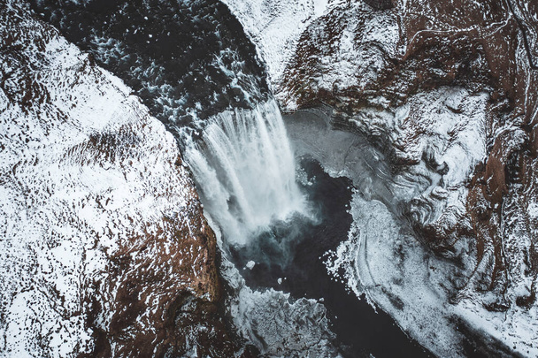 Skogafoss Waterfall in Iceland a Beautiful Landmark Covered in Snow - Φωτογραφία, εικόνα