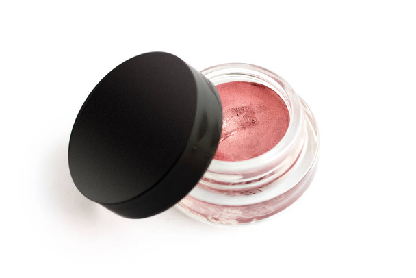 Pink cream eye shadow. Decorative cosmetics on white background - Photo, Image