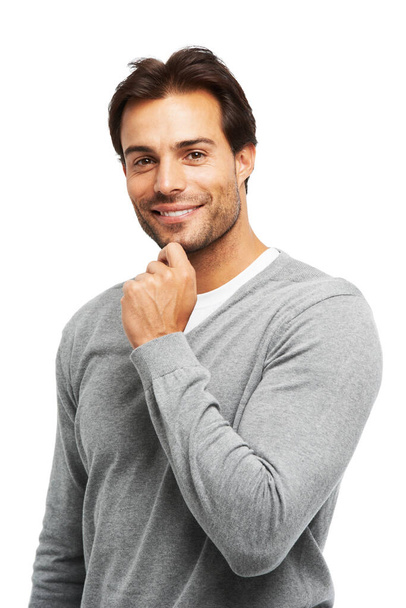 Living his lifestyle. Studio shot of a handsome young man isolated on white - Foto, immagini
