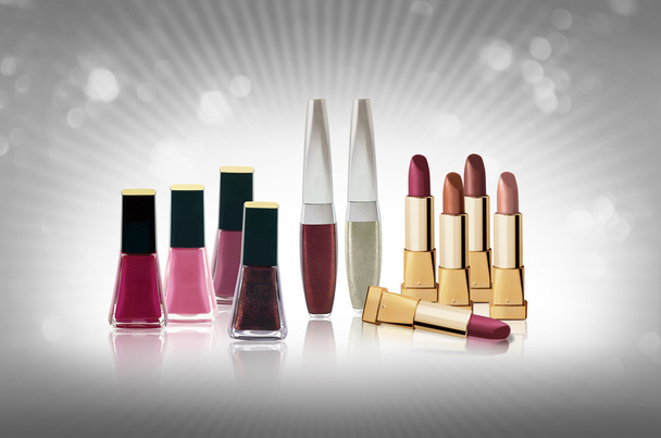 Cosmetics set - lipsticks and nail polishes - Photo, Image