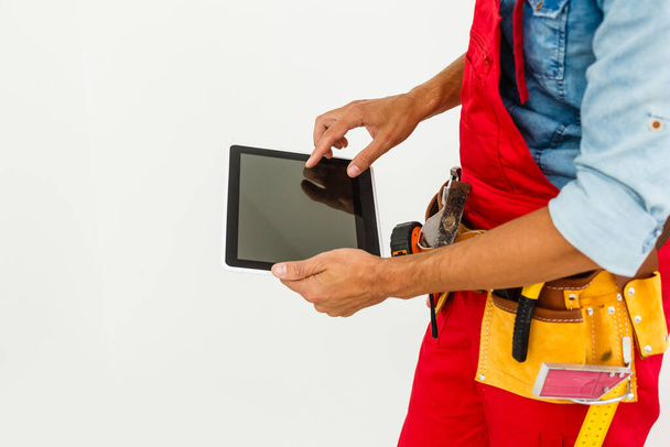 Construction Worker with a tablet. Planning Developer Concept. - Foto, afbeelding