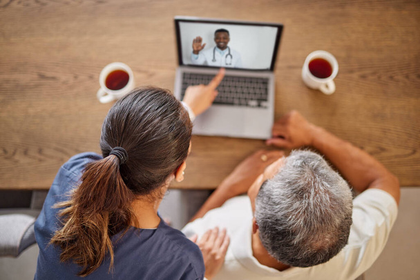 Telehealth doctor, video call laptop and patient consulting, help advice and virtual healthcare, medicine service and expert feedback. Above of people talking to online clinical surgeon over internet. - Foto, afbeelding