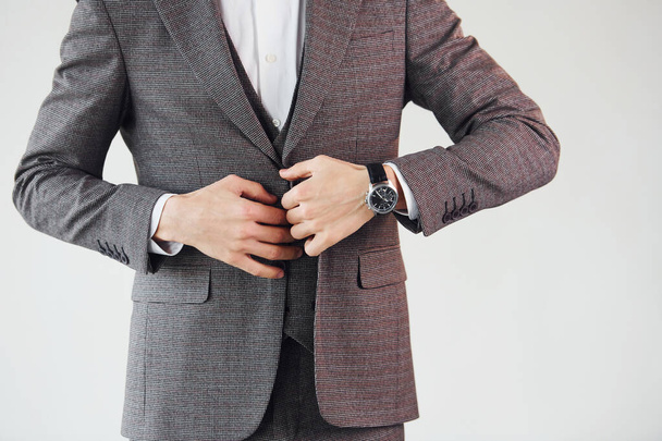 Close up view. Young stylish businessman in suit indoors. Conception of success. - Foto, Imagem